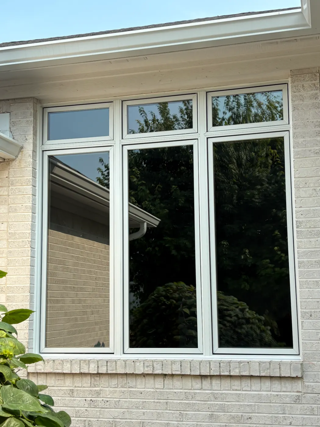 Storm-damaged window documented in Brookshire
